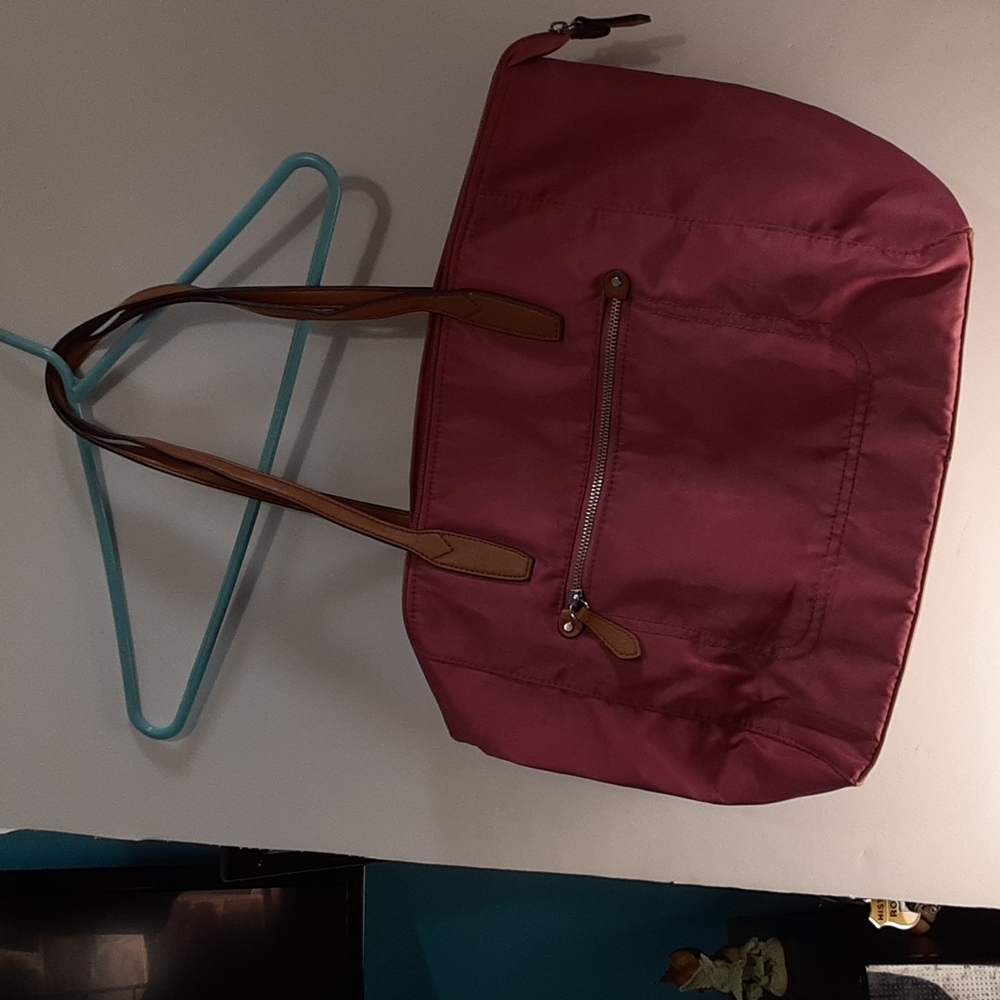 Pink vinyl tote handbag